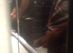 2 BBC's caught playing at one's disposal urinal