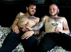 Tatted untidy cubs suck cock