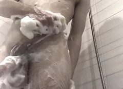 Teen in the air shower with foam